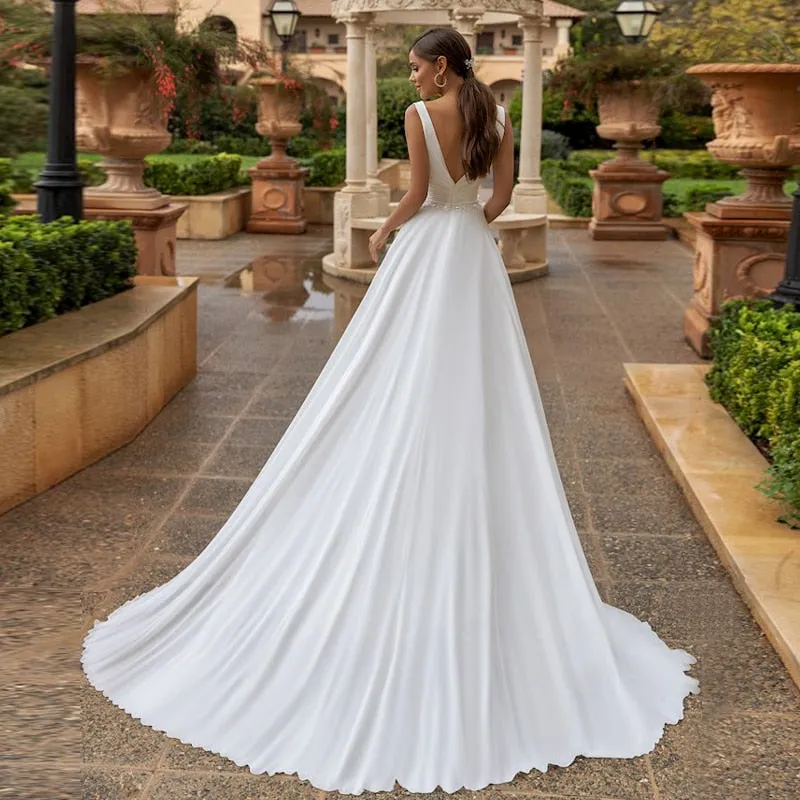 Elegant Flowing Double V-Neck Beach Wedding Dress Beaded Made With Chiffon Bride Features Sweep
