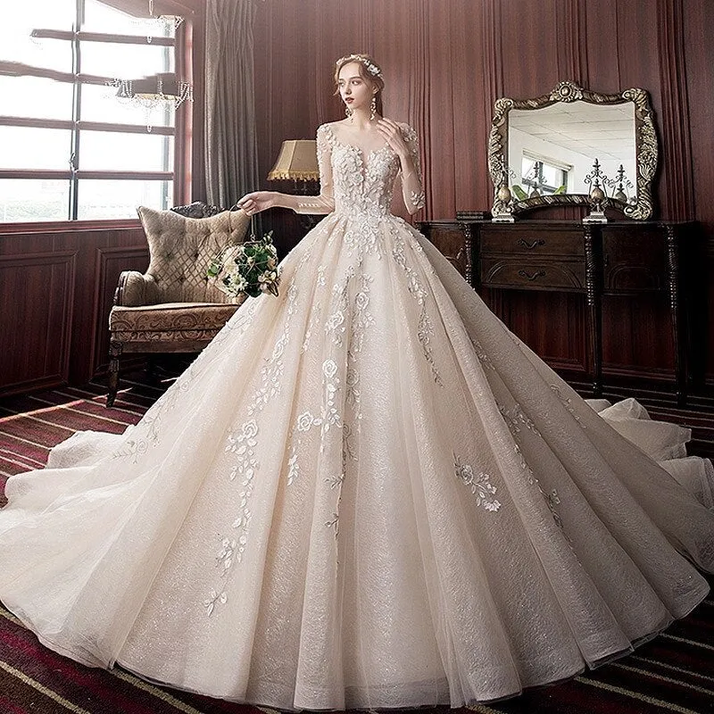 Long Sleeve Wedding Dress New Backless Luxury Hand Made Beading Pearls Lace Appliques Champagne Flash Princess Bridal Ball Gowns