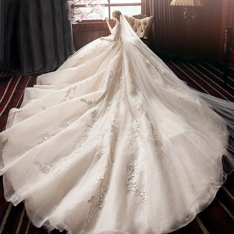 Long Sleeve Wedding Dress New Backless Luxury Hand Made Beading Pearls Lace Appliques Champagne Flash Princess Bridal Ball Gowns
