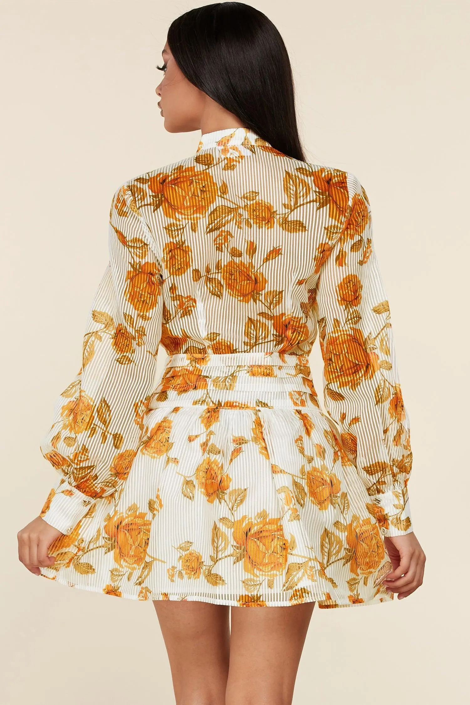 PLEATED CORSET STYLE DROP WAIST MINI DRESS